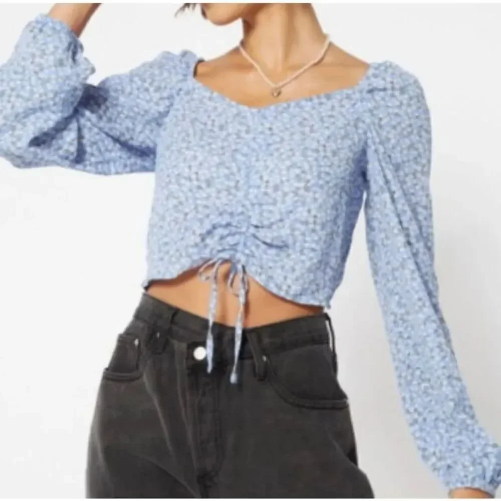 NWOT almost famous blue and white floral Smocked Tie front crop top S/M